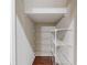 Walk-in pantry featuring wood floors and metal shelving that provides ample storage space at 2275 W Village Se Ln, Smyrna, GA 30080