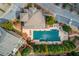 Aerial view of the neighborhood pool with chairs and a gated fence at 2275 W Village Se Ln, Smyrna, GA 30080