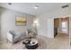 Cozy upstairs sitting area featuring neutral walls, carpet flooring, stylish furniture, and decor at 2275 W Village Se Ln, Smyrna, GA 30080