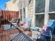 A cozy back deck with comfortable seating, colorful pillows, and a serene outdoor atmosphere perfect for relaxation at 1580 Commerce Dr # A8, Decatur, GA 30030