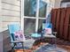 Inviting back deck with comfortable seating, decorative pillows, and a peaceful outdoor ambiance for relaxation at 1580 Commerce Dr # A8, Decatur, GA 30030