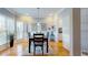 Charming dining room featuring hardwood floors, abundant natural light and detailed trim at 1580 Commerce Dr # A8, Decatur, GA 30030