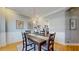 Open-concept dining room featuring hardwood floors and decorative trim at 1580 Commerce Dr # A8, Decatur, GA 30030