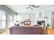 Inviting living room with a fireplace, hardwood floors, and French doors to the outside at 1580 Commerce Dr # A8, Decatur, GA 30030