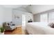 Inviting main bedroom featuring vaulted ceilings, hardwood floors, a seating area, and an ensuite bathroom at 1580 Commerce Dr # A8, Decatur, GA 30030