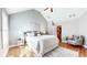 Spacious main bedroom featuring vaulted ceilings, hardwood floors, and a comfortable sitting area near a window at 1580 Commerce Dr # A8, Decatur, GA 30030