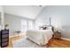 Serene main bedroom with vaulted ceilings, hardwood floors, and large windows, creating a peaceful retreat at 1580 Commerce Dr # A8, Decatur, GA 30030