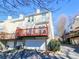 Back of house featuring a deck, an attached garage, and a well-kept yard in a suburban setting at 1580 Commerce Dr # A8, Decatur, GA 30030