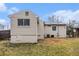Backyard view of home showing the siding and windows on a cloudy day at 1899 Lathrop Se St, Atlanta, GA 30315