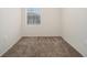 Bedroom with carpeted floor and fresh paint, with outlets on all walls at 1899 Lathrop Se St, Atlanta, GA 30315