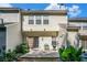 Private back patio with sliding glass doors and outdoor seating area at 2280 Whitestone Pl, Alpharetta, GA 30005