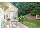 Outdoor patio area features a grill and overlooks a lush green backyard at 2280 Whitestone Pl, Alpharetta, GA 30005