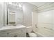 Bright bathroom featuring a vanity with storage, and a shower-tub combo at 2280 Whitestone Pl, Alpharetta, GA 30005