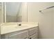 Bathroom vanity features a neutral countertop and a large mirror at 2280 Whitestone Pl, Alpharetta, GA 30005