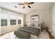 Staged bedroom showcases a modern design, lots of light, and new furnishings at 2280 Whitestone Pl, Alpharetta, GA 30005