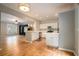 Open-concept kitchen with stainless appliances and views of living space at 2280 Whitestone Pl, Alpharetta, GA 30005