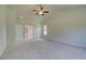 Spacious bedroom boasts neutral walls, carpet, and a doorway to an en-suite bathroom at 30 Homesite Cooper E Cv, Fayetteville, GA 30215