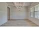 Bright dining room features coffered ceilings, wainscoting and hardwood flooring at 30 Homesite Cooper E Cv, Fayetteville, GA 30215
