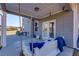 Inviting back porch featuring a hanging swing and comfortable seating at 4675 Dandelion Way, Cumming, GA 30040