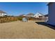 Expansive backyard featuring a storage shed, providing ample space for outdoor activities and relaxation at 4675 Dandelion Way, Cumming, GA 30040