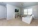 Neutral-toned bedroom with TV, storage, comfortable chair and plenty of natural light at 4675 Dandelion Way, Cumming, GA 30040