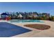 Community pool with large pool deck and mature landscaping at 4675 Dandelion Way, Cumming, GA 30040