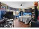 Bedroom showcasing hardwood floors, a large window, and ample space for relaxing and entertainment at 90 Lakeside Dr, Hiram, GA 30141