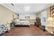 Bedroom showcasing hardwood floors, natural light, and plenty of space at 90 Lakeside Dr, Hiram, GA 30141