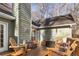 Outdoor deck area featuring plenty of seating, space for entertaining, and string lights at 90 Lakeside Dr, Hiram, GA 30141