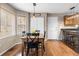 Eat-in kitchen area with hardwood floors and large windows at 90 Lakeside Dr, Hiram, GA 30141