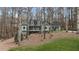 Charming green home with a well-maintained yard and mature trees offering a peaceful setting at 90 Lakeside Dr, Hiram, GA 30141