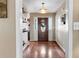 Bright foyer with hardwood floors, a decorative front door, and neutral wall paint at 90 Lakeside Dr, Hiram, GA 30141