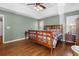 Spacious main bedroom with tray ceilings and hardwood floors at 90 Lakeside Dr, Hiram, GA 30141
