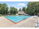 Relaxing pool area with plenty of seating and a sundeck perfect for enjoying the summer weather at 90 Lakeside Dr, Hiram, GA 30141