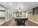 Recreation room with a billiards table and ample space for entertainment at 90 Lakeside Dr, Hiram, GA 30141