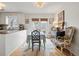Bright dining room with elegant decor, a unique table setting, and access to the backyard at 1101 Collier Nw Rd # U6, Atlanta, GA 30318