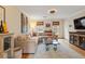 Inviting living room with stylish decor, a comfortable sectional sofa, and a decorative display cabinet at 1101 Collier Nw Rd # U6, Atlanta, GA 30318