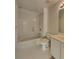 Bathroom featuring a shower-tub combo, a toilet, and a vanity with a sink at 11365 Donnington Dr, Duluth, GA 30097