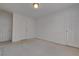 Bedroom featuring a closet door, one window, and neutral carpet at 11365 Donnington Dr, Duluth, GA 30097
