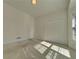 Bedroom with closet door, one window, and carpeted flooring at 11365 Donnington Dr, Duluth, GA 30097