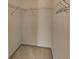 Walk-in closet featuring metal storage solutions and carpeted flooring at 11365 Donnington Dr, Duluth, GA 30097