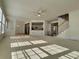 Open concept living area with stairs, lots of light and views to the kitchen at 11365 Donnington Dr, Duluth, GA 30097