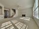 Open living space featuring a fireplace, multiple windows, and a staircase at 11365 Donnington Dr, Duluth, GA 30097