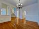 Open-concept living room with hardwood floors and detailed trim at 11365 Donnington Dr, Duluth, GA 30097