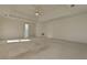 Bright and airy main bedroom with carpet, tray ceiling, and multiple closets at 11365 Donnington Dr, Duluth, GA 30097