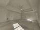 Bright and airy main bedroom with carpet, tray ceiling, and ample closet space at 11365 Donnington Dr, Duluth, GA 30097