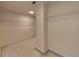 Spacious walk-in closet features ample shelving and neutral carpeting for maximum storage capacity at 11365 Donnington Dr, Duluth, GA 30097