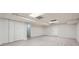 The basement features vinyl floors, a ceiling with recessed lighting and closet for storage at 140 Grosvenor Pl, Atlanta, GA 30328