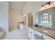 Elegant bathroom boasting granite countertops, double sinks, and a soaking tub at 140 Grosvenor Pl, Atlanta, GA 30328