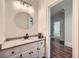 Charming bathroom featuring granite countertops, a modern sink and stylish fixtures at 140 Grosvenor Pl, Atlanta, GA 30328